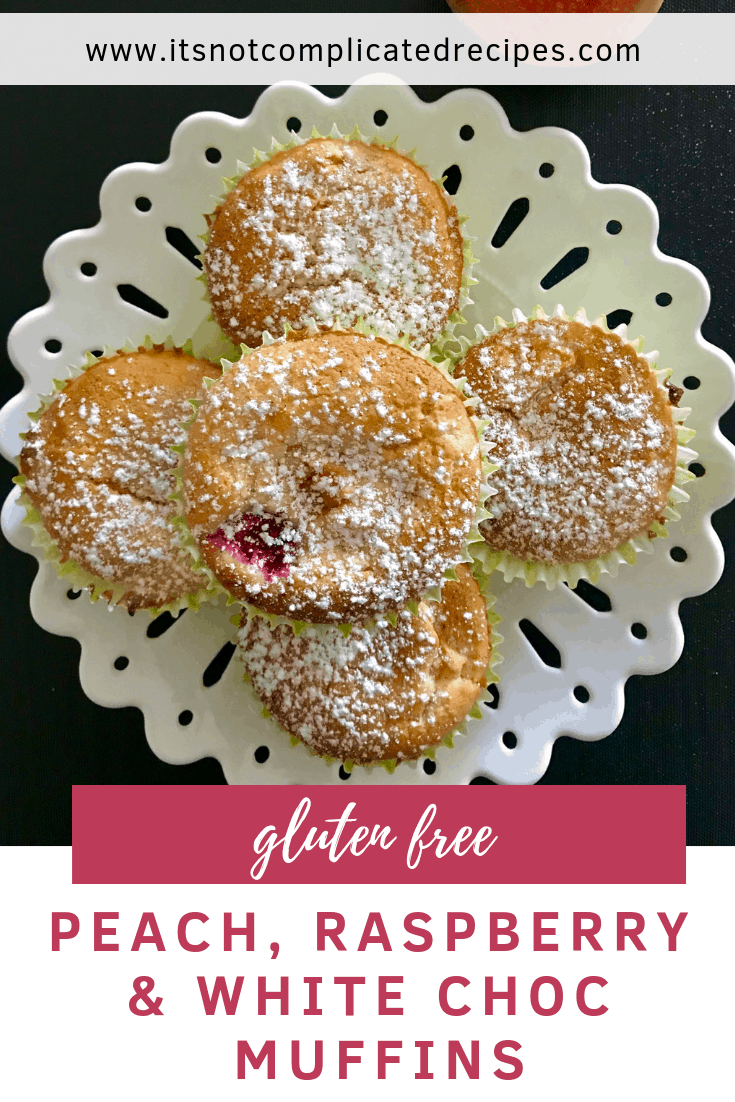 Gluten Free Peach, Raspberry and White Chocolate Muffins - It's Not Complicated Recipes #dessert #muffins #whitechocolate #peach #raspberry #glutenfree #dessertideas #partyfood