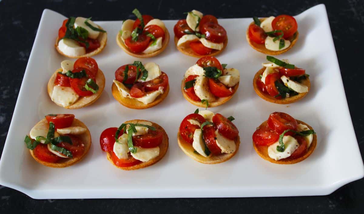 Caprese Bread Tartlets. A recipe by It's Not Complicated Recipes.