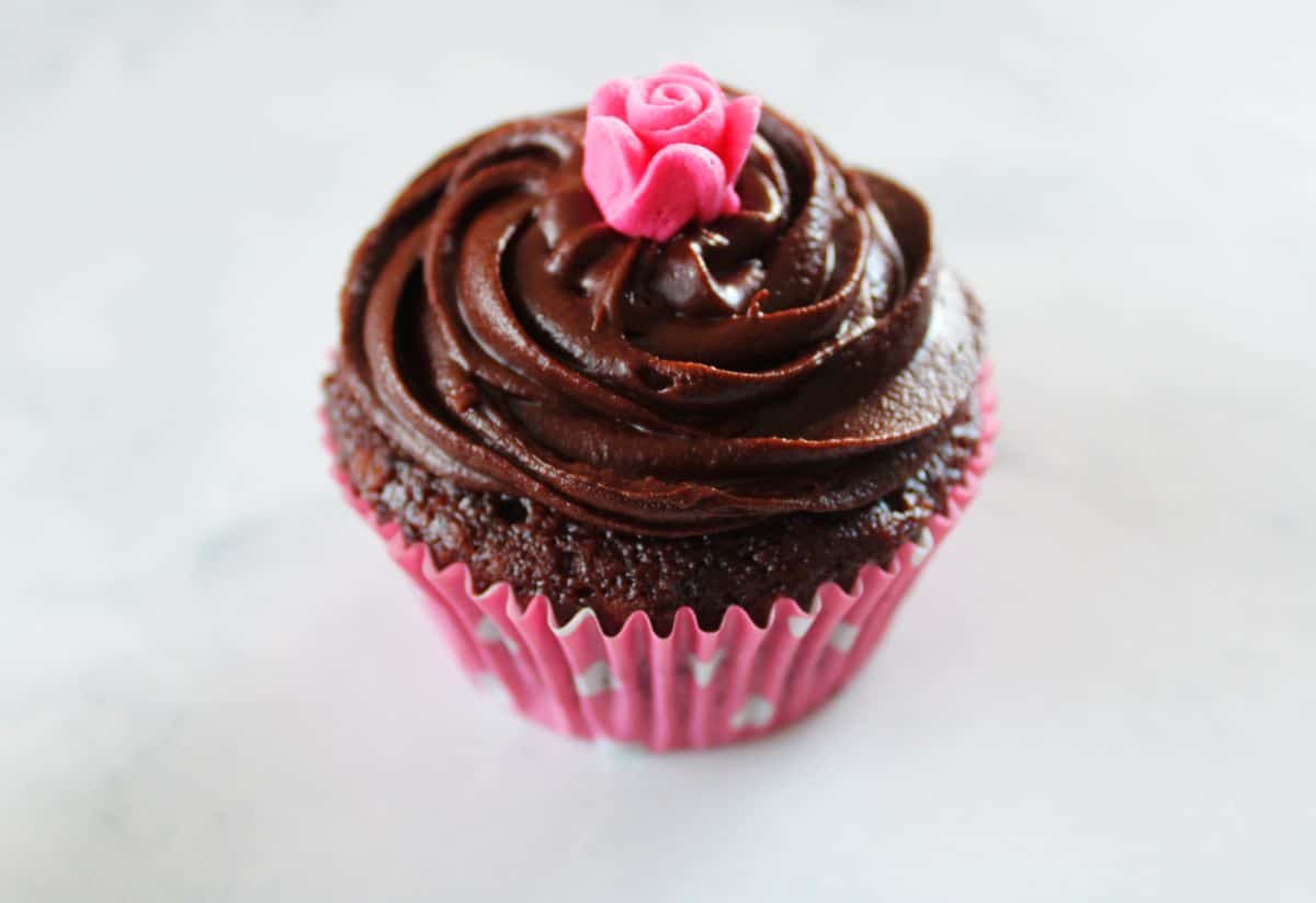 Up close shot of one vegan chocolate cupcake.