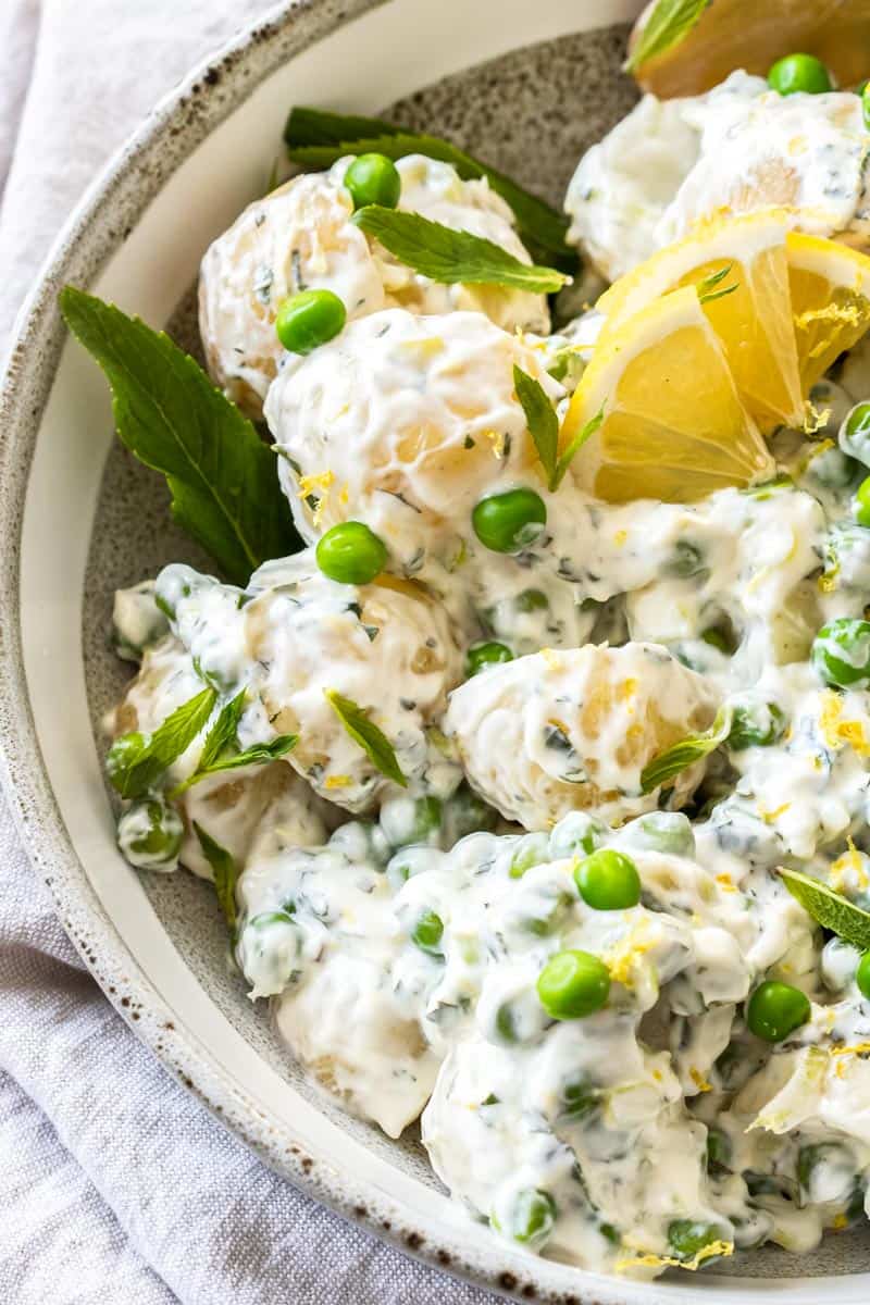 Up close shot of half a bowl of potato salad.