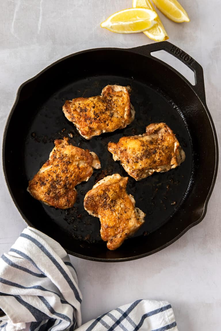 Crispy Boneless Cast Iron Chicken Thighs - It's Not Complicated Recipes