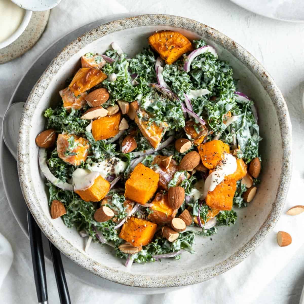 https://itsnotcomplicatedrecipes.com/wp-content/uploads/2021/12/Kale-and-Sweet-Potato-Salad-Feature.jpg