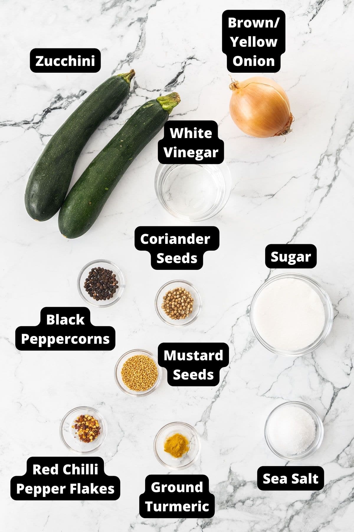 Ingredients in this recipe on a white and grey marble background.