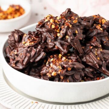 Round white bowl of Chilli Chocolate Clusters.