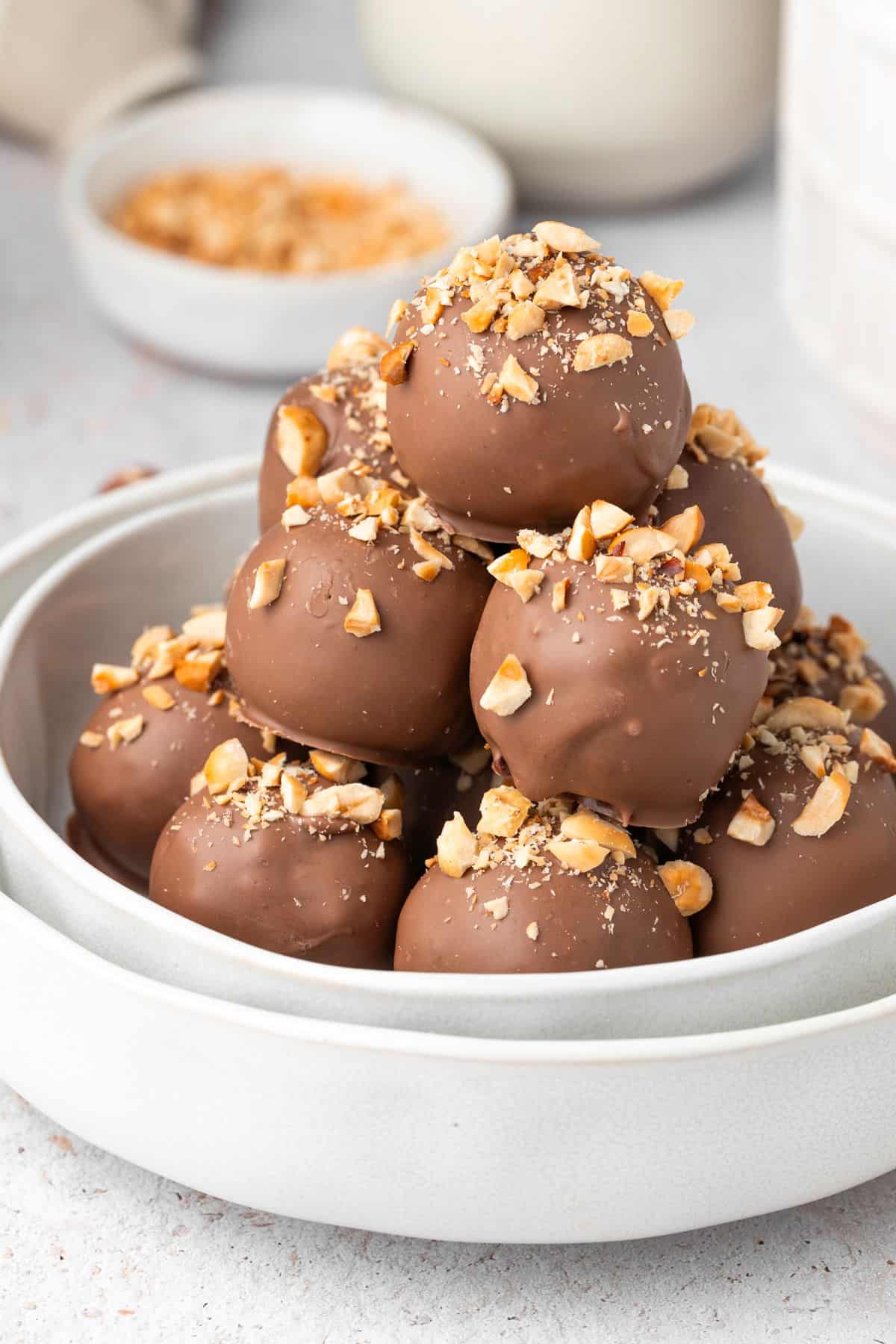 Round dish with stack of Hazelnut Truffles.