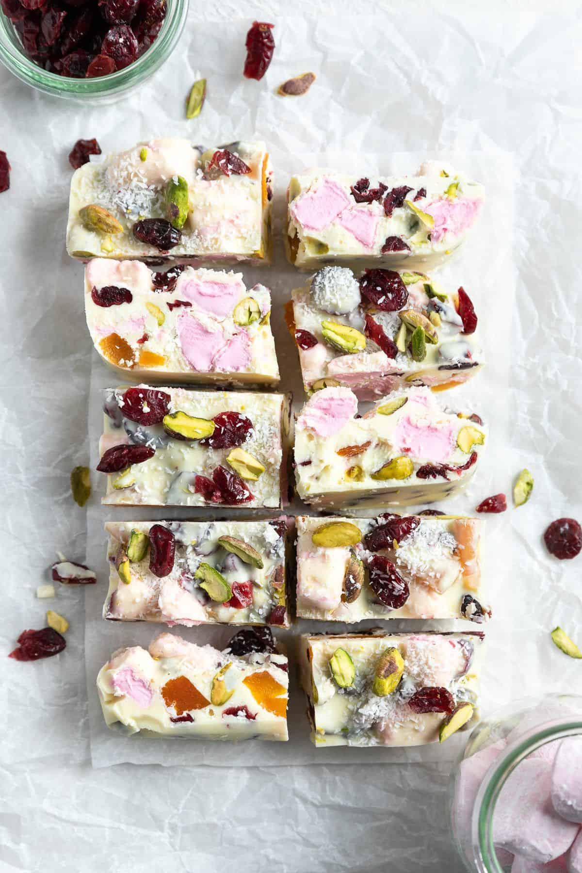 Cut pieces of White Chocolate Rocky Road on a piece of baking paper.