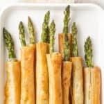 Pinterest image with photo of Asparagus Filo Rolls.