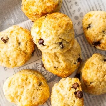 Chocolate Chip Scones sitting on some baking paper.