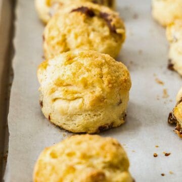 Date and Lemon Buttermilk Scones on a baking paper lined baking tray.