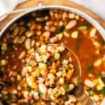 Pinterest image with photo of Ham and Cannellini Bean Soup.