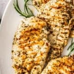Pinterest image with photo of Mediterranean Marinated Chicken Breast.