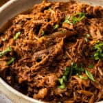 Pinterest image with photo of Mediterranean Pulled Beef.