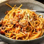 Pinterest image with photo of Mushroom and Tomato Pasta.