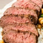 Pinterest image with photo of Marinated Lamb Backstrap.