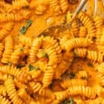 Pinterest image with photo of Creamy Roasted Red Pepper Pasta.