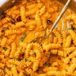 Pinterest image with photo of Creamy Roasted Red Pepper Pasta.