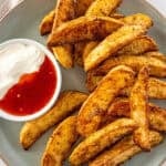 Pinterest image with photo of Crispy Baked Potato Wedges.