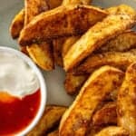 Pinterest image with photo of Crispy Baked Potato Wedges.