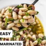 Pinterest image with photo of Marinated White Beans.