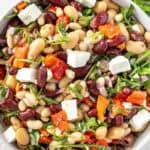 Pinterest image with photo of Mediterranean Bean Salad.