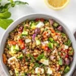 Pinterest image with photo of Mediterranean Lentil Salad.